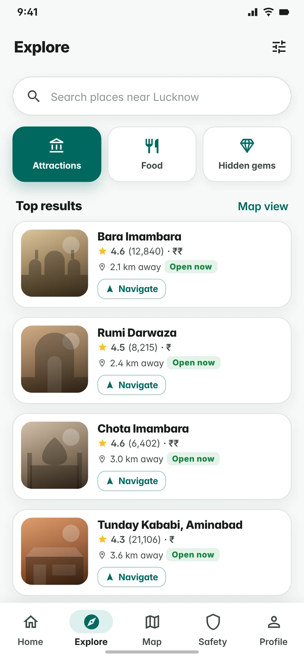 Tourism explore screen listing nearby attractions with ratings, distance and navigate buttons